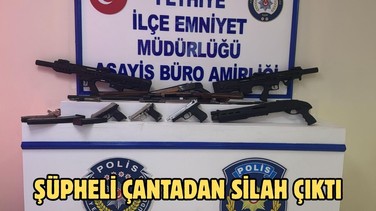 Şüpheli çantadan silah çıktı