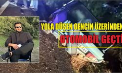 Yola düşen gencin üzerinden otomobil geçti