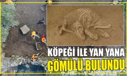 Köpeği ile yan yana gömülü bulundu