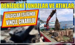 Denizdeki tonozlar ve atıklar dalgıçlar eşliğinde vinçle çıkarıldı