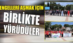 Engelleri aşmak için birlikte yürüdüler