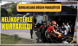 Kayalıklara düşen paraşütçüsü helikopterle kurtarıldı