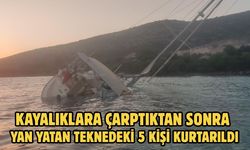 Kayalıklara çarptıktan sonra yan yatan teknedeki 5 kişi kurtarıldı