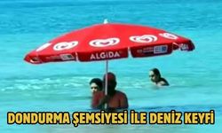 Dondurma şemsiyesi ile deniz keyfi