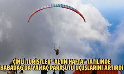 Çinli turistler "Altın Hafta" tatilinde Babadağ'da yamaç paraşütü uçuşlarını artırdı
