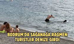 Bodrum'da sağanağa rağmen turistler denize girdi