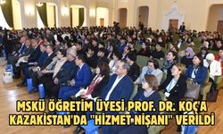 MSKÜ öğretim üyesi Prof. Dr. Koç'a Kazakistan'da "Hizmet Nişanı" verildi