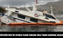Marmaris'te su alıp yarısı batan tekneden yakıt sızıntısına karşı önlem alındı