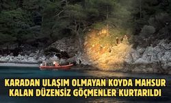 Karadan ulaşım olmayan koyda mahsur kalan düzensiz göçmenler kurtarıldı