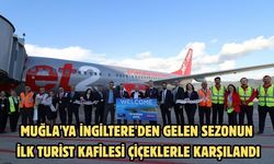 Muğla'ya İngiltere'den gelen sezonun ilk turist kafilesi çiçeklerle karşılandı