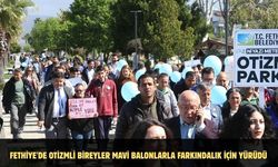 Fethiye'de otizmli bireyler mavi balonlarla farkındalık için yürüdü