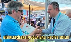 BİSİKLETÇİLERE MUĞLA BALI HEDİYE EDİLDİ