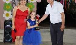 Köyceğiz’de Muhtar Acar’dan başarılı öğrenciye ödül