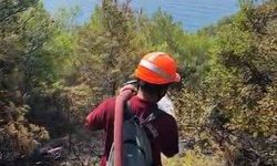 Marmaris'te yangın bölgesinde yeniden alevlenmelere karşı yoğun mesai