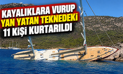 Kayalıklara vurup yan yatan teknedeki 11 kişi kurtarıldı