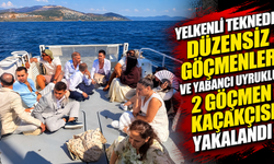 Yelkenli teknede düzensiz göçmenler ve yabancı uyruklu 2 göçmen kaçakçısı yakalandı