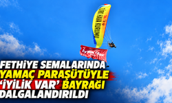 Fethiye semalarında yamaç paraşütüyle "İyilik Var" bayrağı dalgalandırıldı