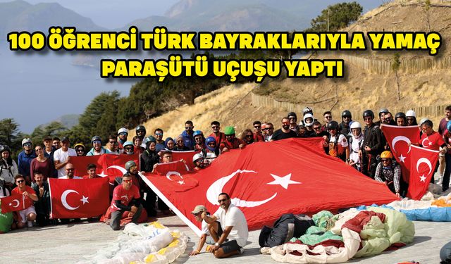 100 öğrenci Türk bayraklarıyla yamaç paraşütü uçuşu yaptı