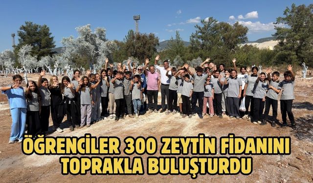 Öğrenciler 300 zeytin fidanını toprakla buluşturdu