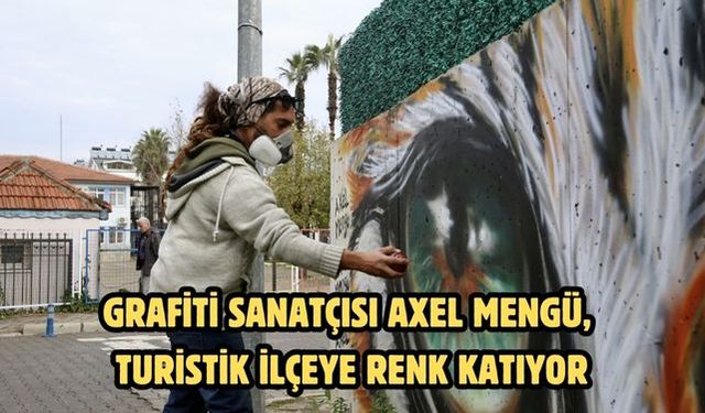 Grafiti sanatçısı Axel Mengü, turistik ilçeye renk katıyor