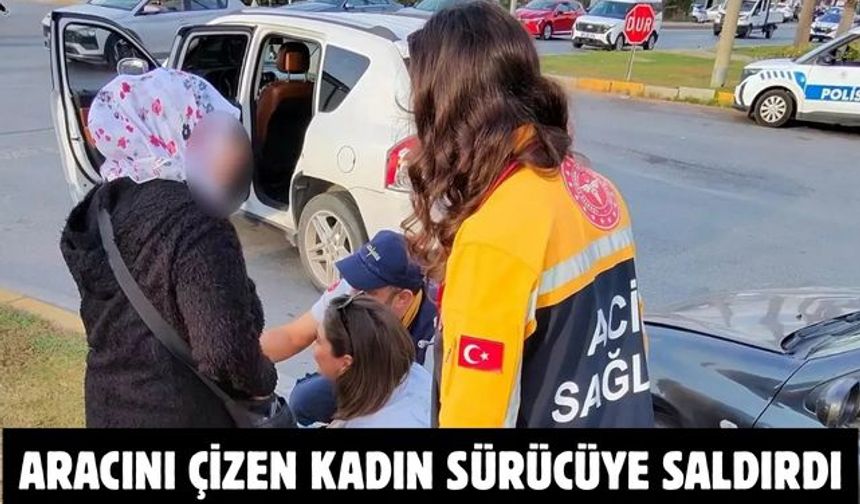 Aracını Çizen Kadın Sürücüye Saldırdı