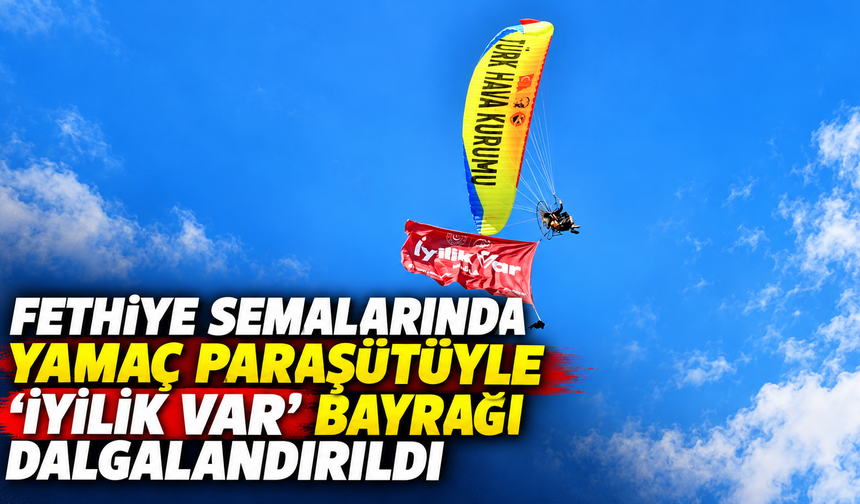 Fethiye semalarında yamaç paraşütüyle "İyilik Var" bayrağı dalgalandırıldı